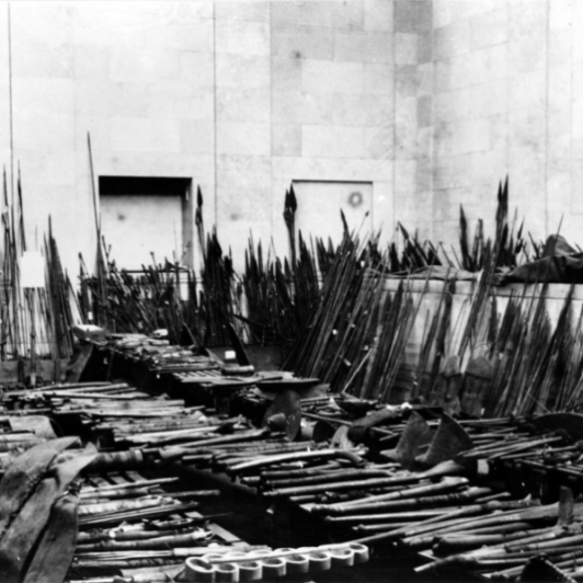 Weapons originally belonging to the Wellcome Historical Medical Museum laid out in the Duveen Gallery at the British Museum, 1955. Wellcome Collection